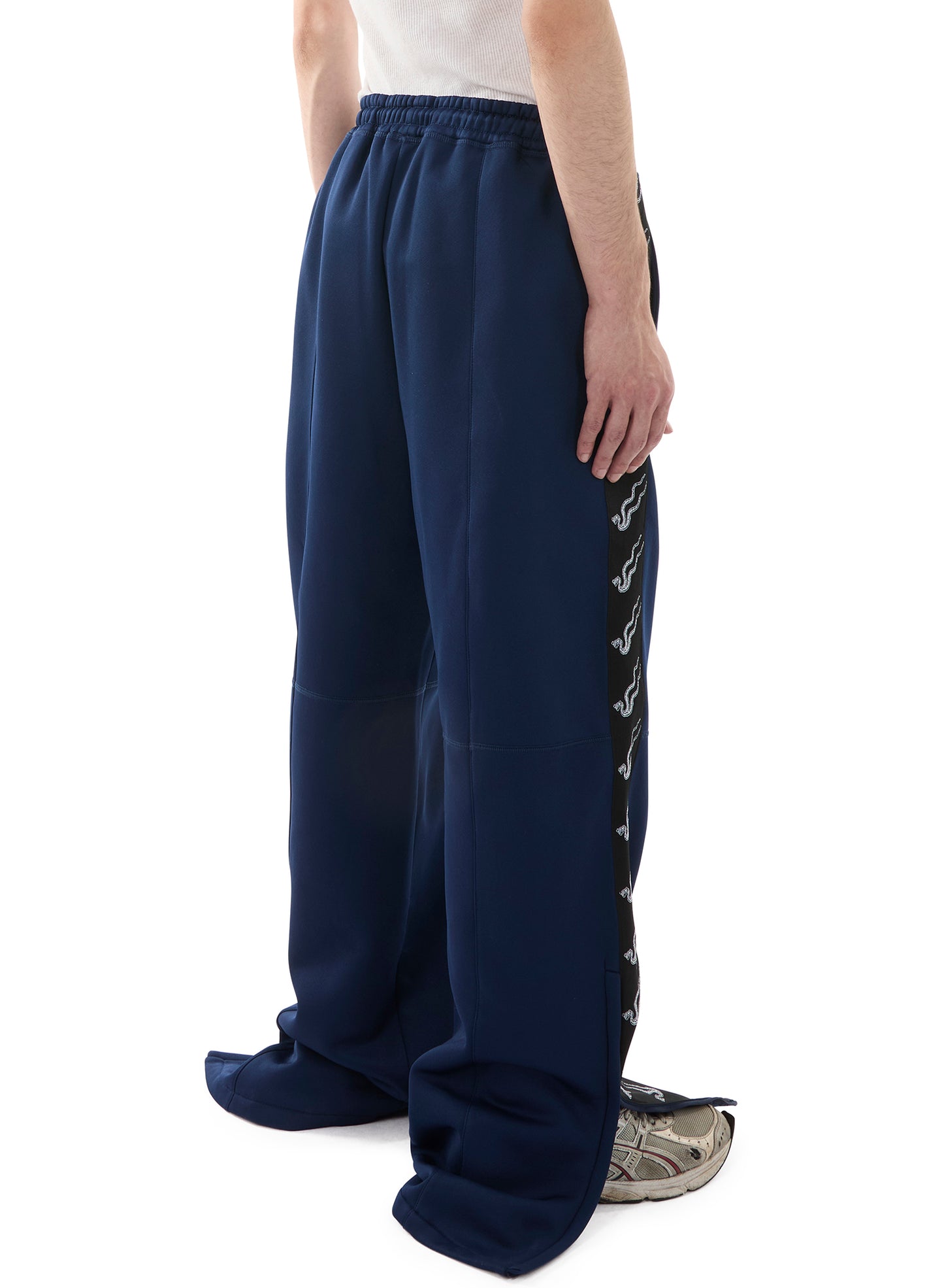 STACKED TRACK PANTS